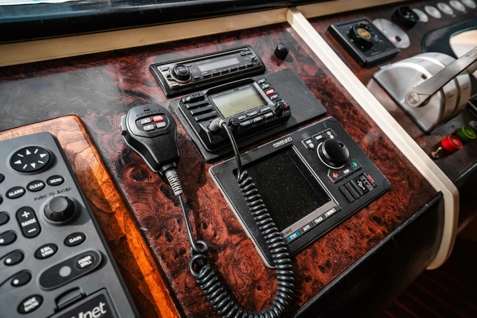 a group of electronic devices on a table aboard LADY GERTS Yacht for Sale