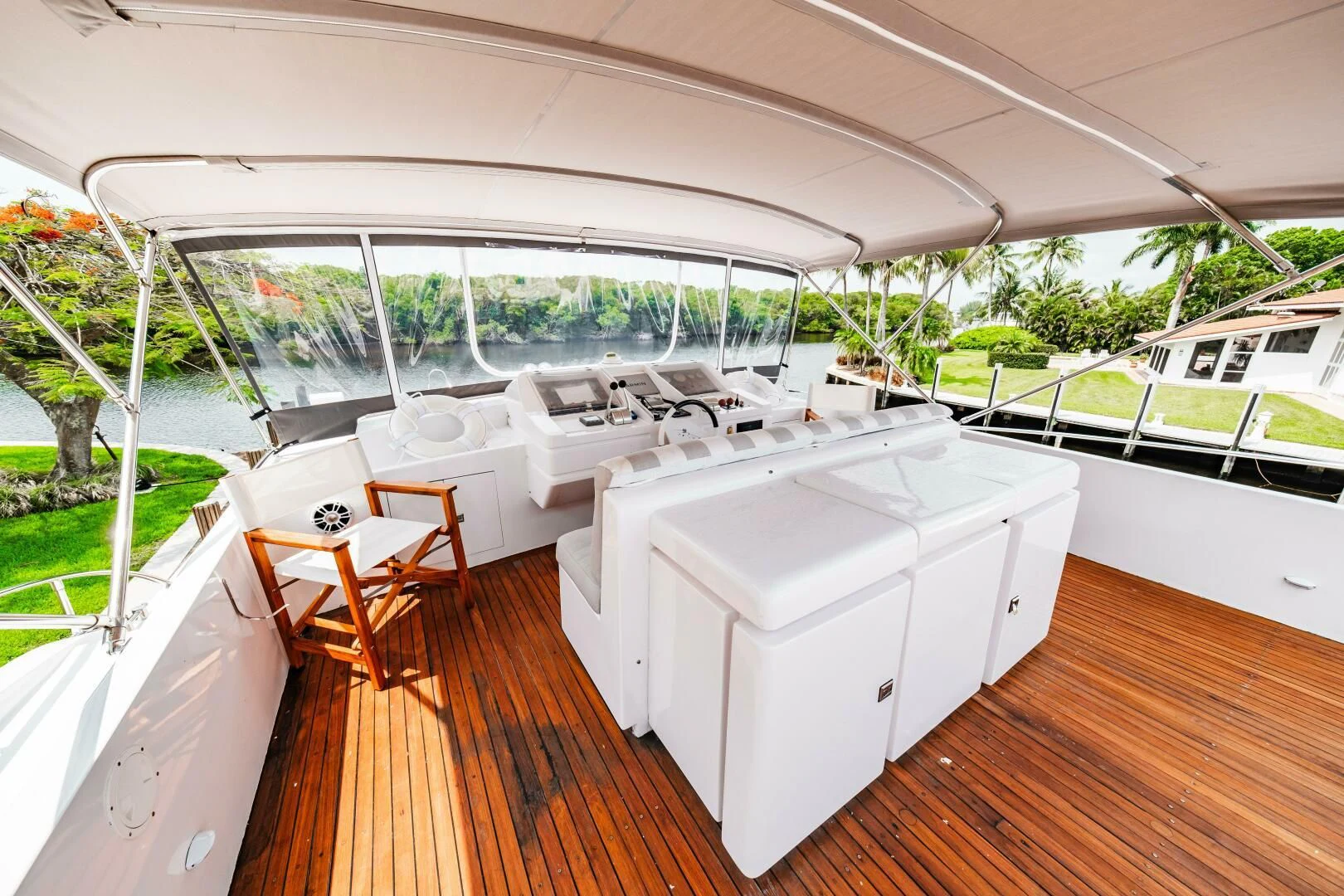 a room with a large white bed aboard LADY GERTS Yacht for Sale