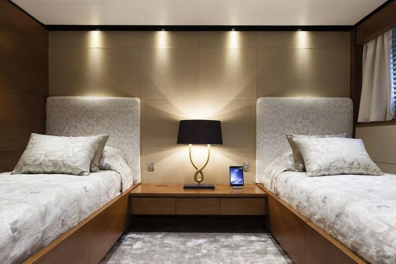 a couple of beds in a hotel room aboard MEDIALLY Yacht for Sale