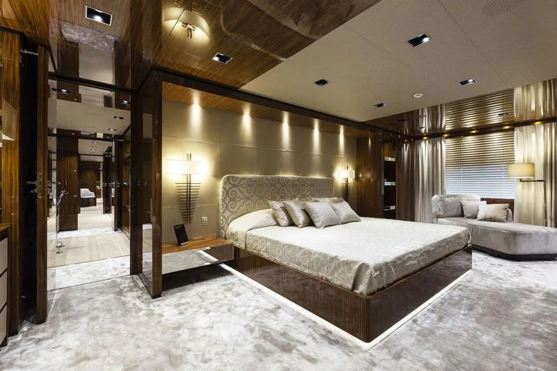 a large bedroom with a large bed aboard MEDIALLY Yacht for Sale
