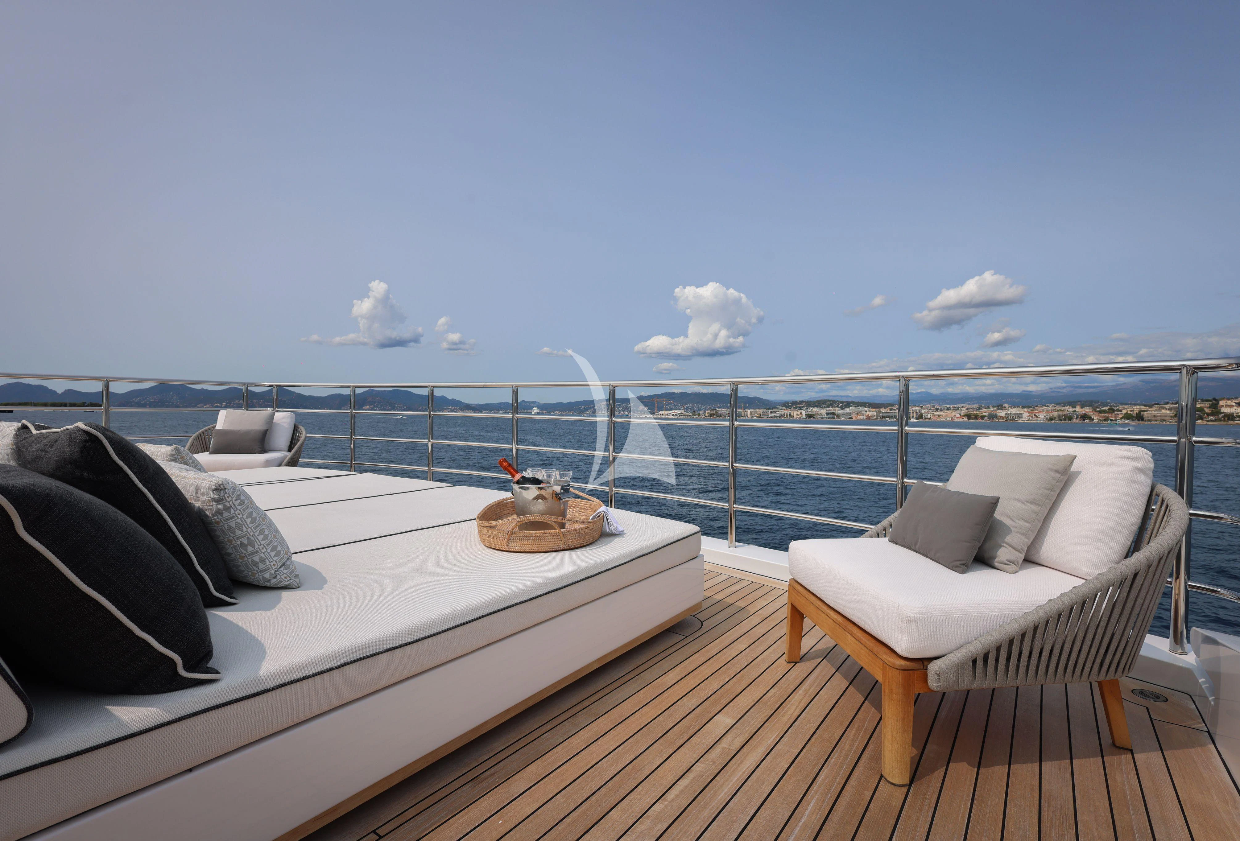 a balcony overlooking the ocean aboard MEDIALLY Yacht for Sale