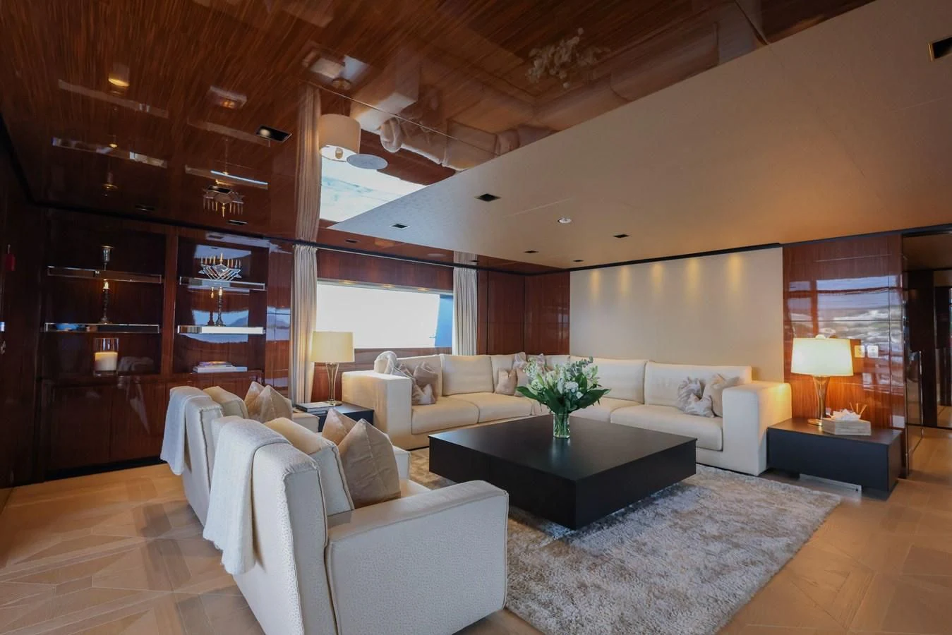 a living room with a large window aboard MEDIALLY Yacht for Sale