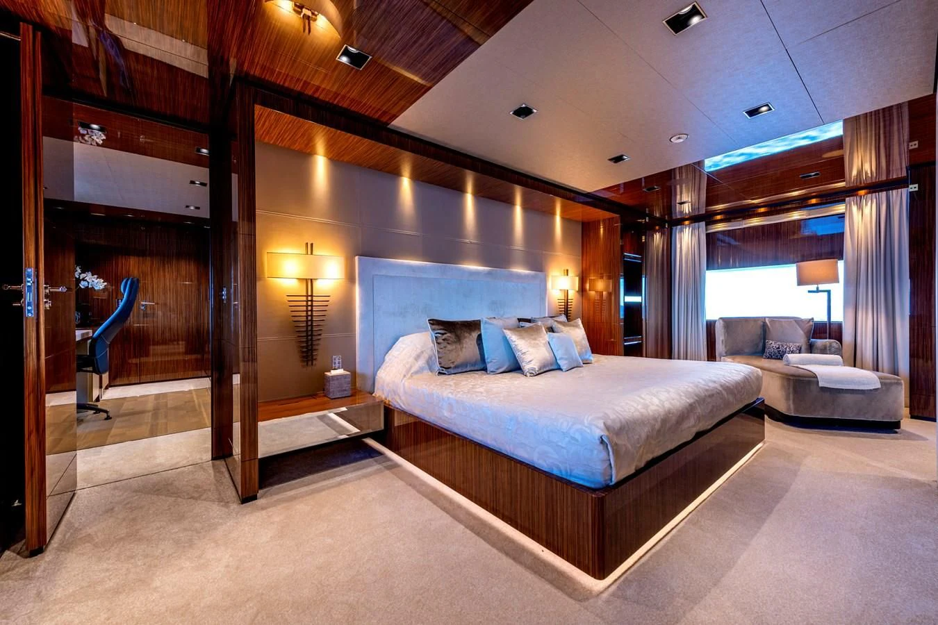 a large bedroom with a large bed aboard MEDIALLY Yacht for Sale