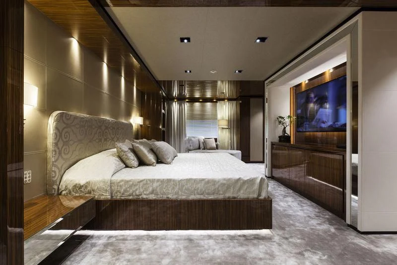 a large bed in a room aboard MEDIALLY Yacht for Sale