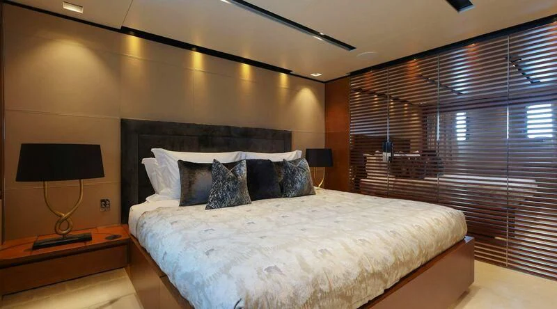 a bed in a room aboard MEDIALLY Yacht for Sale