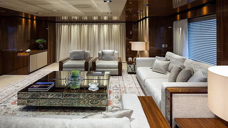 a living room with a large rug aboard MEDIALLY Yacht for Sale