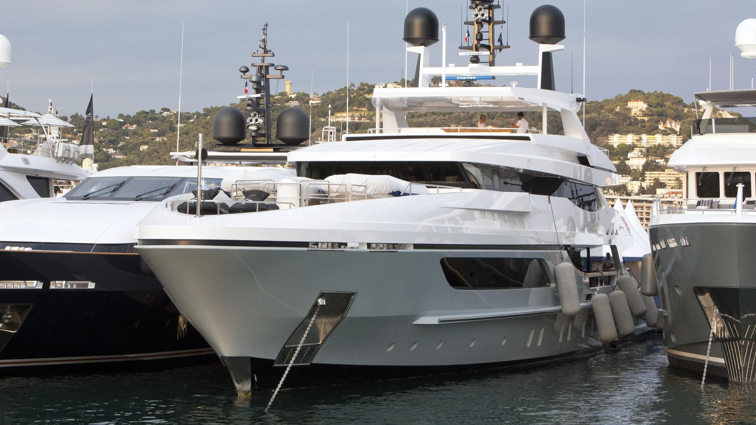 a large white boat sits in the water aboard MEDIALLY Yacht for Sale