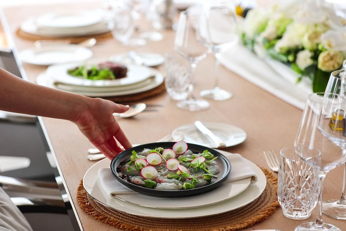 a person eating a salad aboard MEDIALLY Yacht for Sale