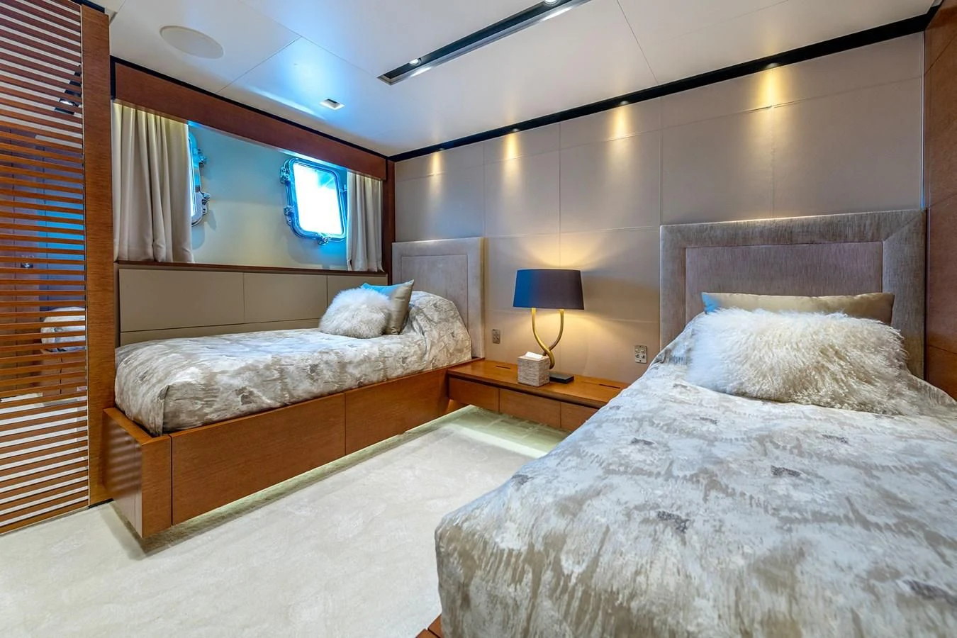 a couple of beds in a hotel room aboard MEDIALLY Yacht for Sale