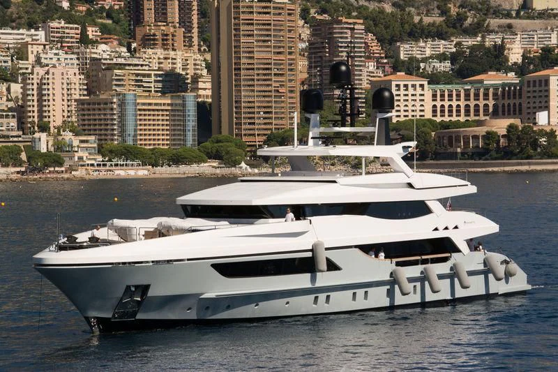 a white boat on the water aboard MEDIALLY Yacht for Sale