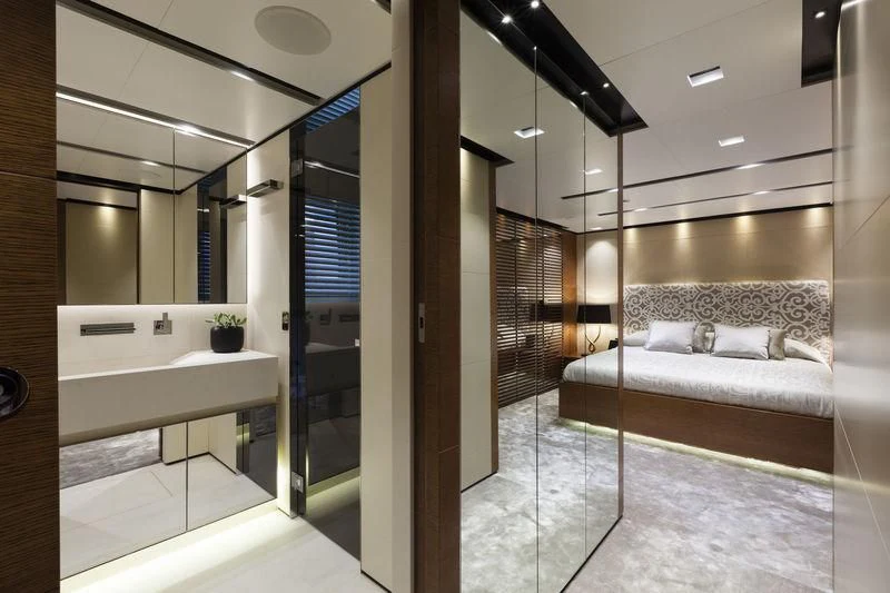 a bathroom with a large mirror aboard MEDIALLY Yacht for Sale