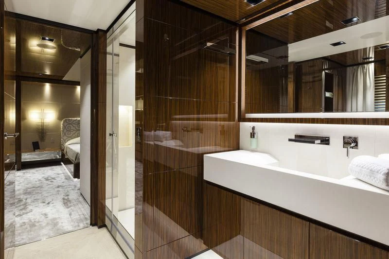 a bathroom with a tub and shower aboard MEDIALLY Yacht for Sale