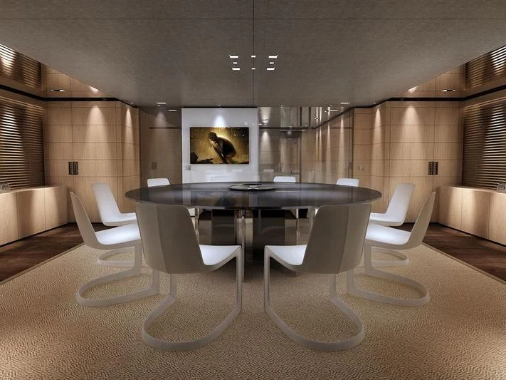 a large room with a table and chairs aboard MEDIALLY Yacht for Sale