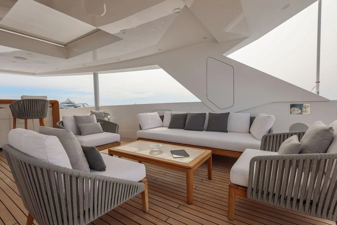 a room with a couch and a table aboard MEDIALLY Yacht for Sale