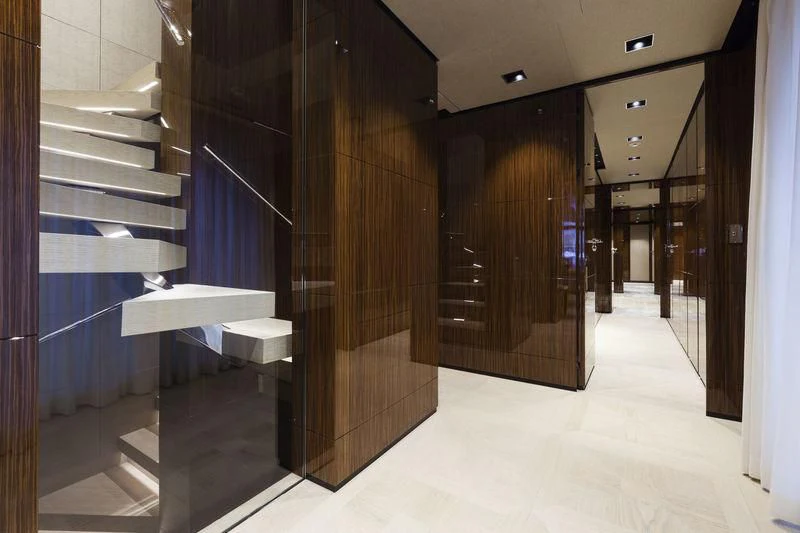 a large room with a glass wall aboard MEDIALLY Yacht for Sale