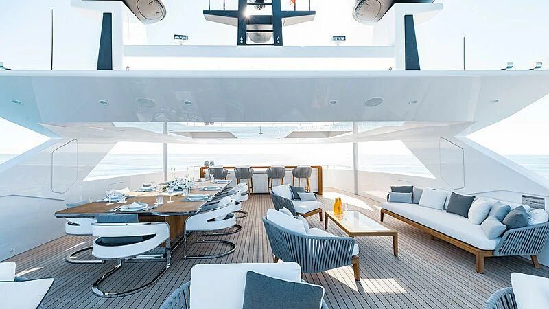 a room with a couch and a table aboard MEDIALLY Yacht for Sale