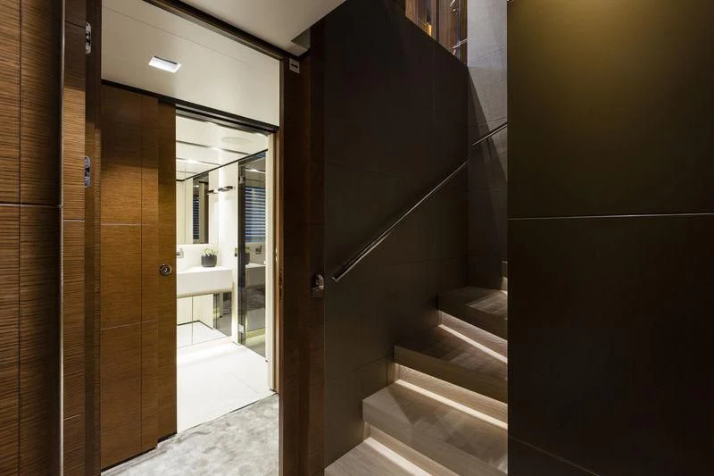 a bathroom with a black shower aboard MEDIALLY Yacht for Sale