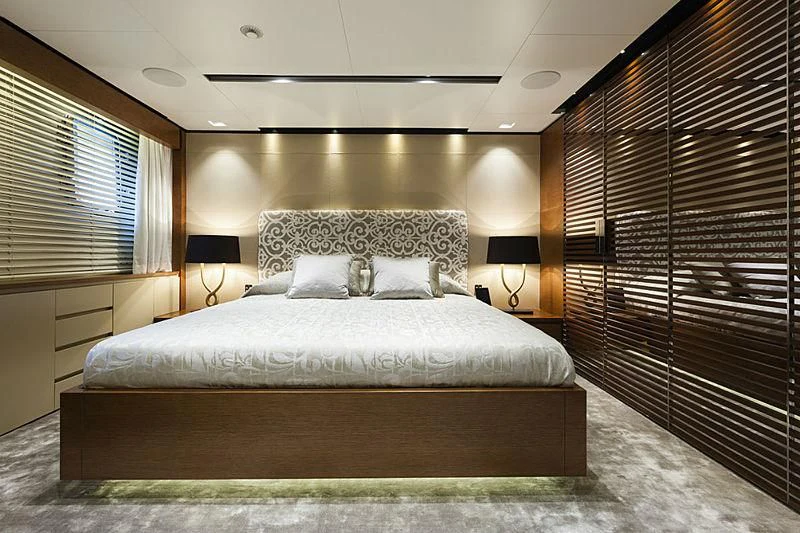 a bed in a room aboard MEDIALLY Yacht for Sale