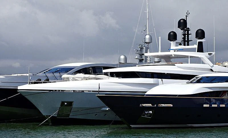 a few white yachts on a grass field aboard MEDIALLY Yacht for Sale