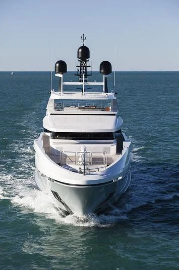 a white boat on the water aboard MEDIALLY Yacht for Sale