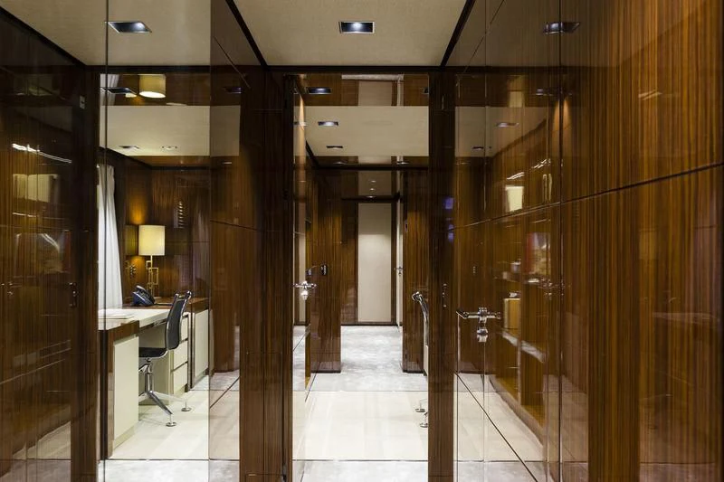 a room with a large glass wall aboard MEDIALLY Yacht for Sale
