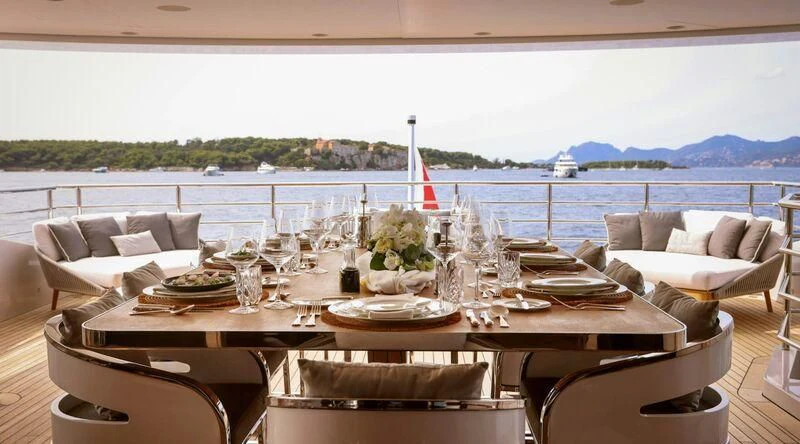 a table set for a meal aboard MEDIALLY Yacht for Sale