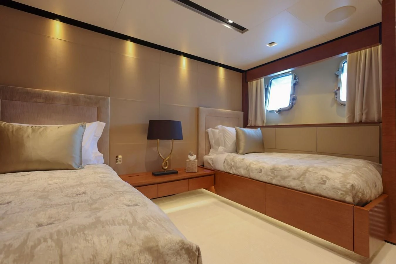 a couple of beds in a hotel room aboard MEDIALLY Yacht for Sale