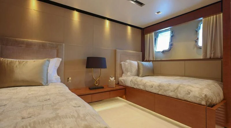 a room with two beds aboard MEDIALLY Yacht for Sale