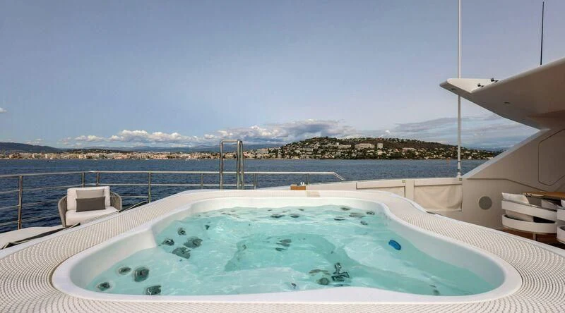 a large swimming pool aboard MEDIALLY Yacht for Sale