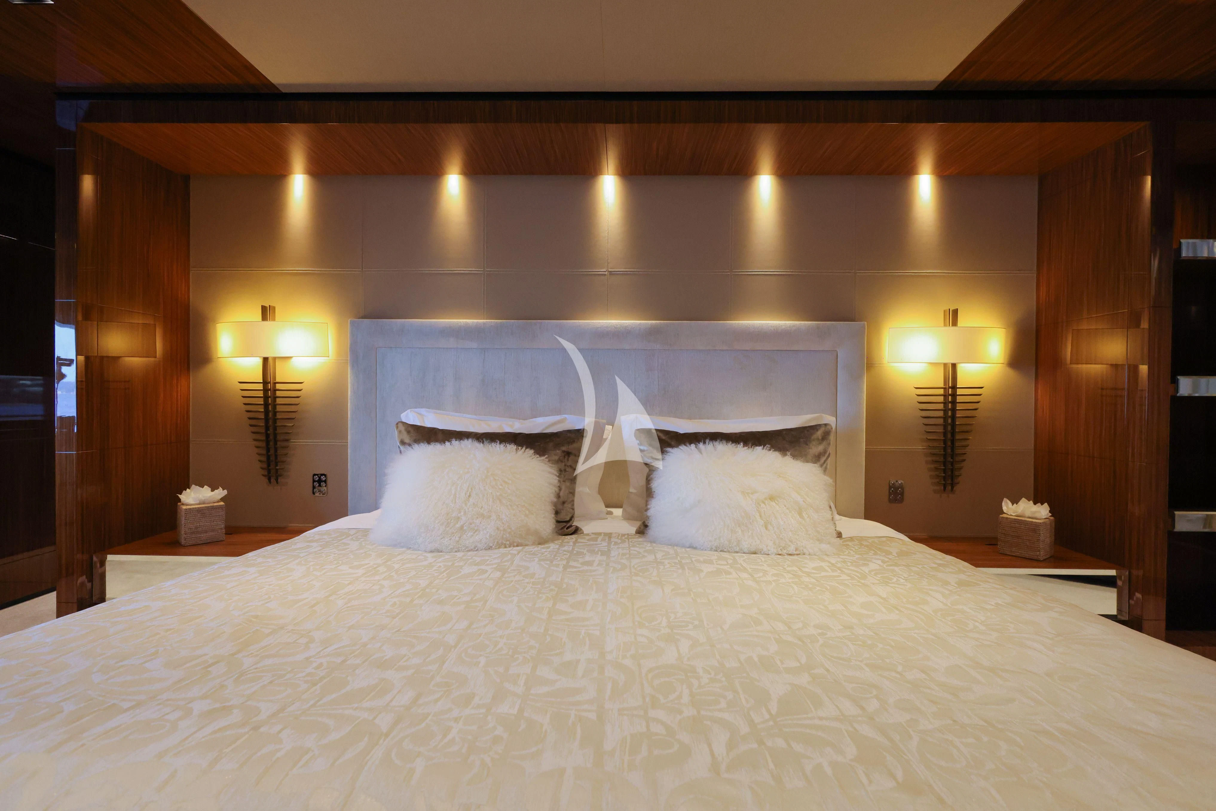 a bed with white sheets aboard MEDIALLY Yacht for Sale