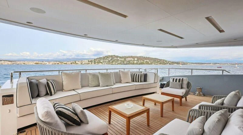 a living room with a large window aboard MEDIALLY Yacht for Sale