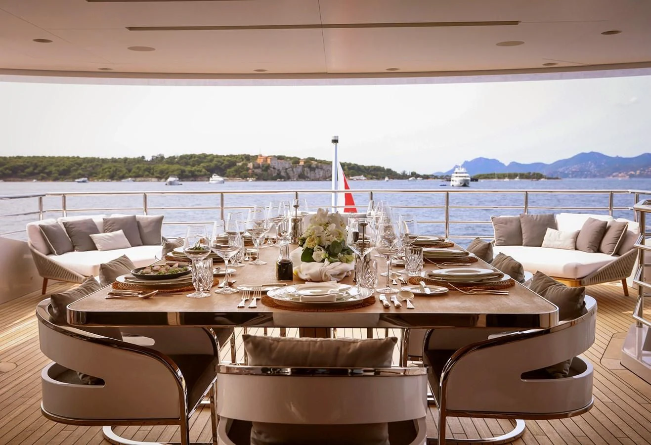 a table set for a dinner aboard MEDIALLY Yacht for Sale
