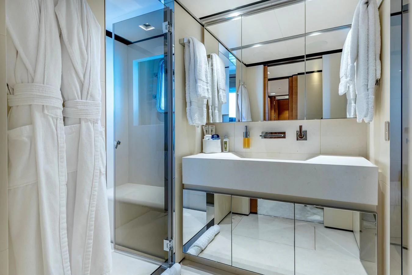 a bathroom with a sink and a mirror aboard MEDIALLY Yacht for Sale
