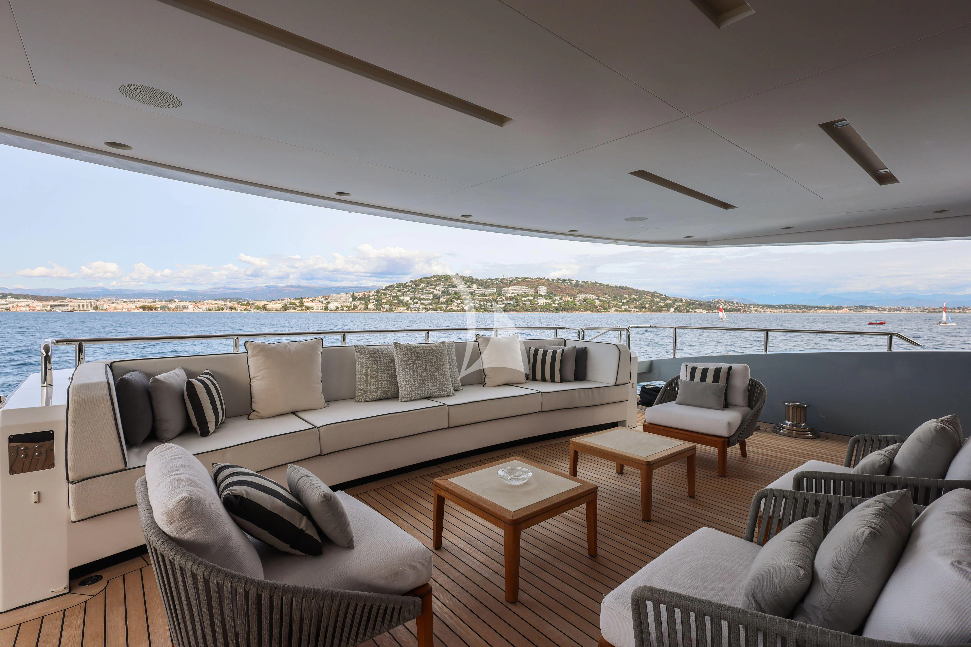 a living room with a large window aboard MEDIALLY Yacht for Sale