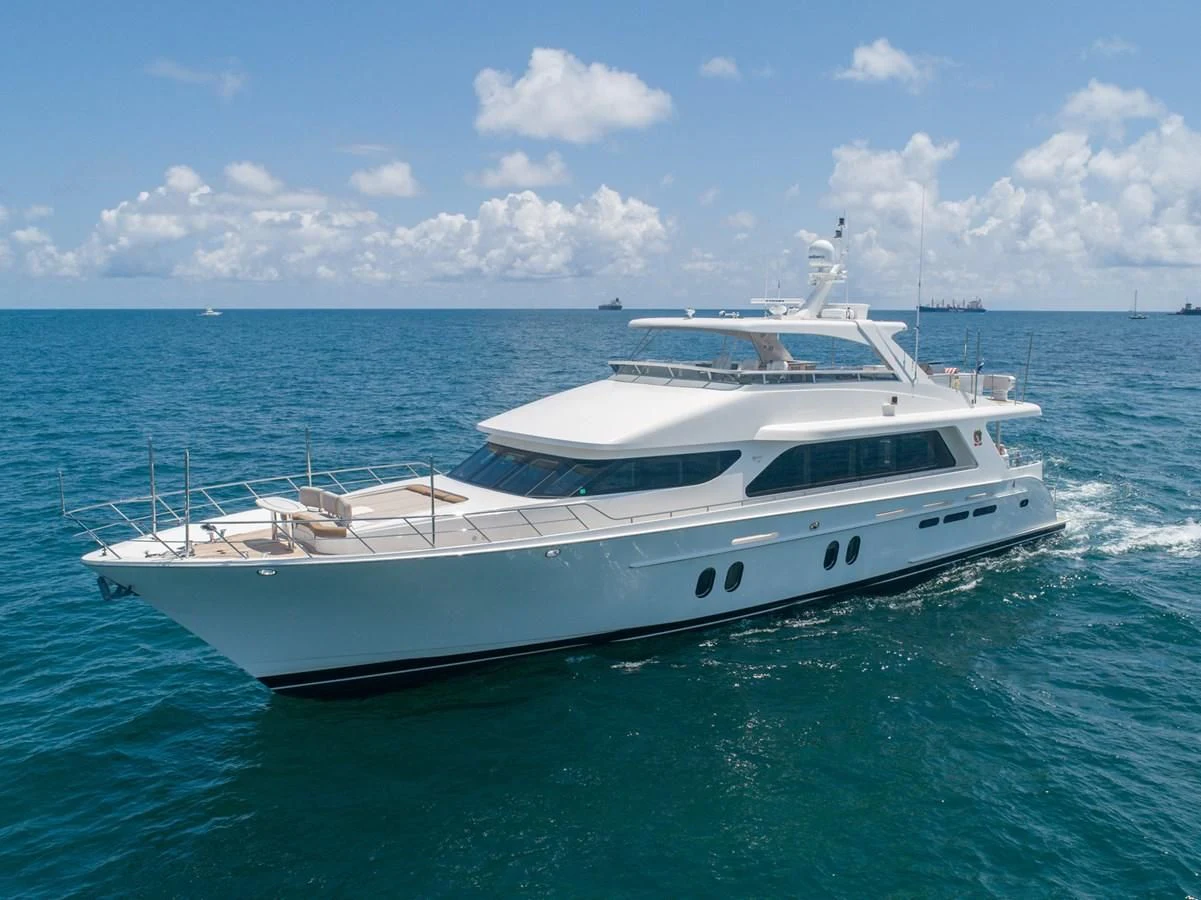 a white yacht in the water aboard BRAVO Yacht for Sale