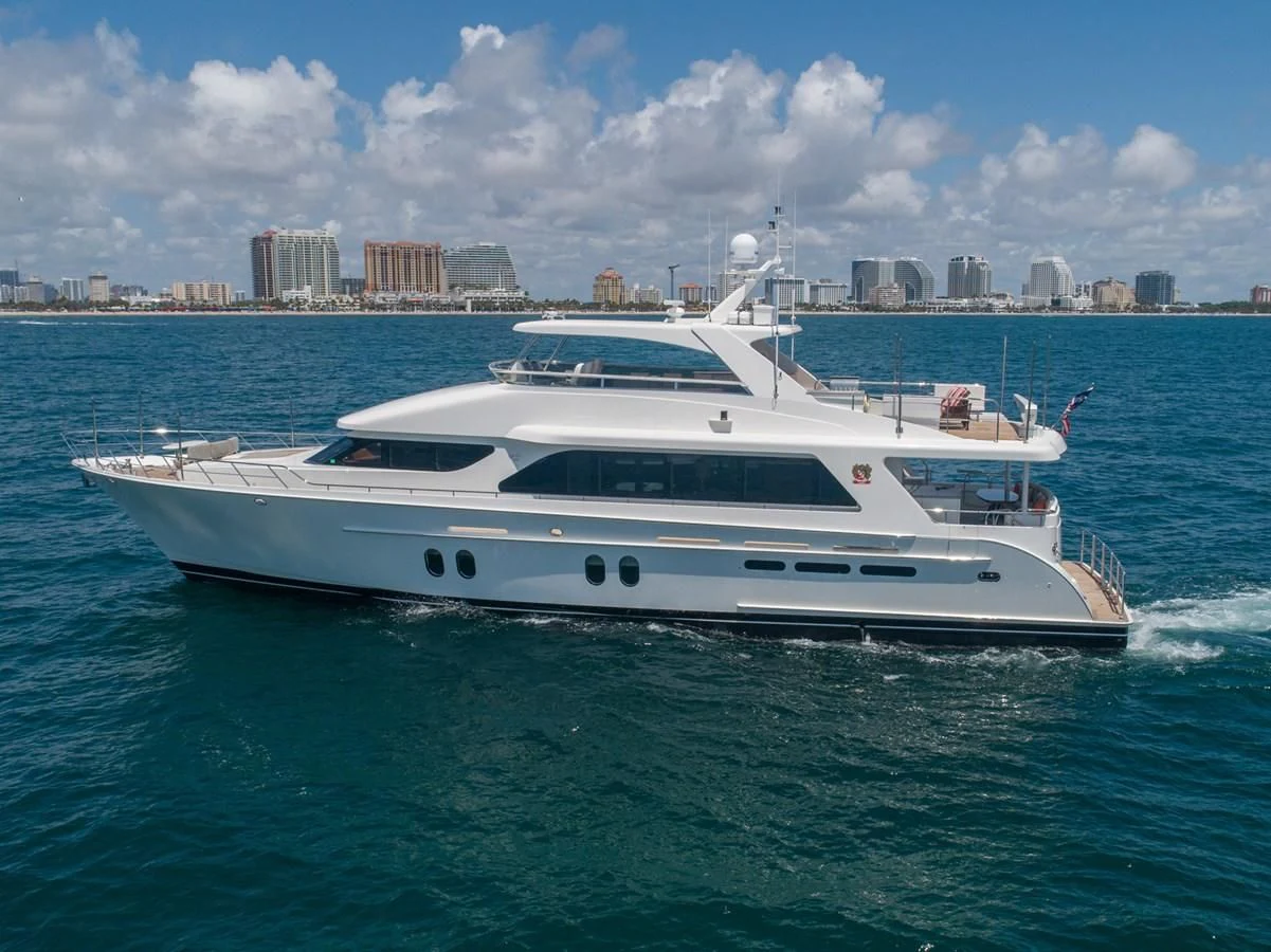 a white yacht in the water aboard BRAVO Yacht for Sale