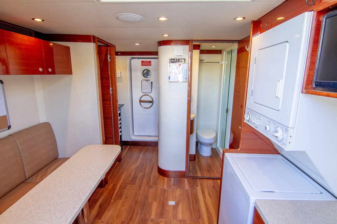 a large bathroom with a large sink aboard BRAVO Yacht for Sale