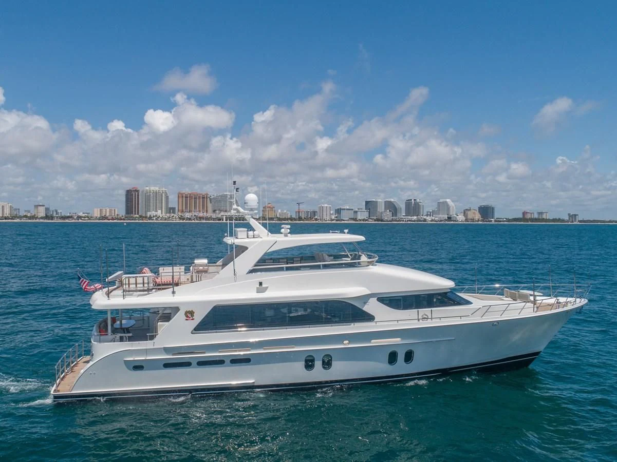 a white yacht in the water aboard BRAVO Yacht for Sale