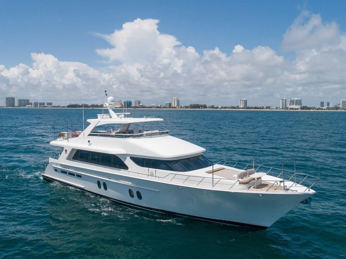 a white yacht in the water aboard BRAVO Yacht for Sale