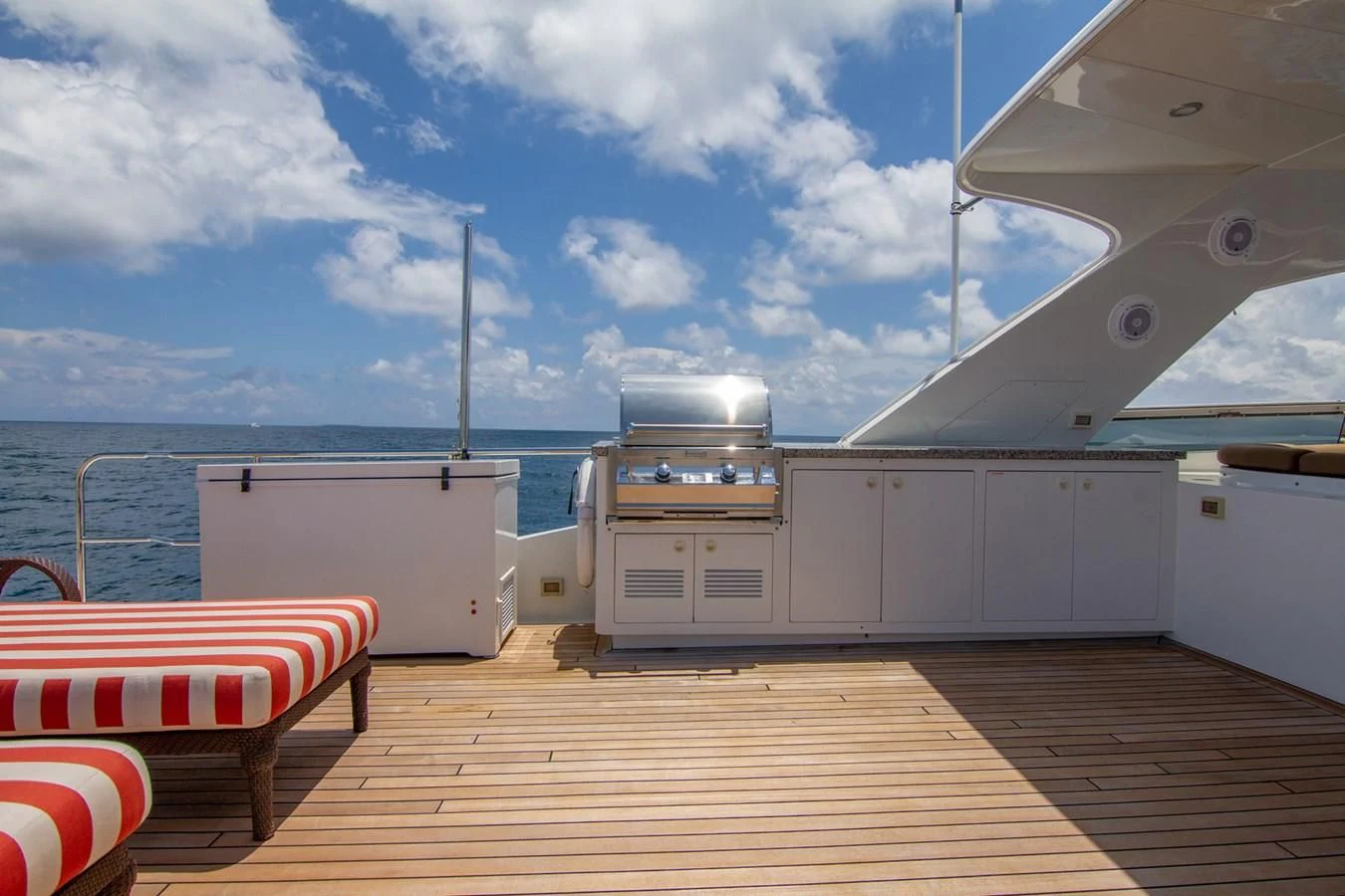a boat on a dock aboard BRAVO Yacht for Sale