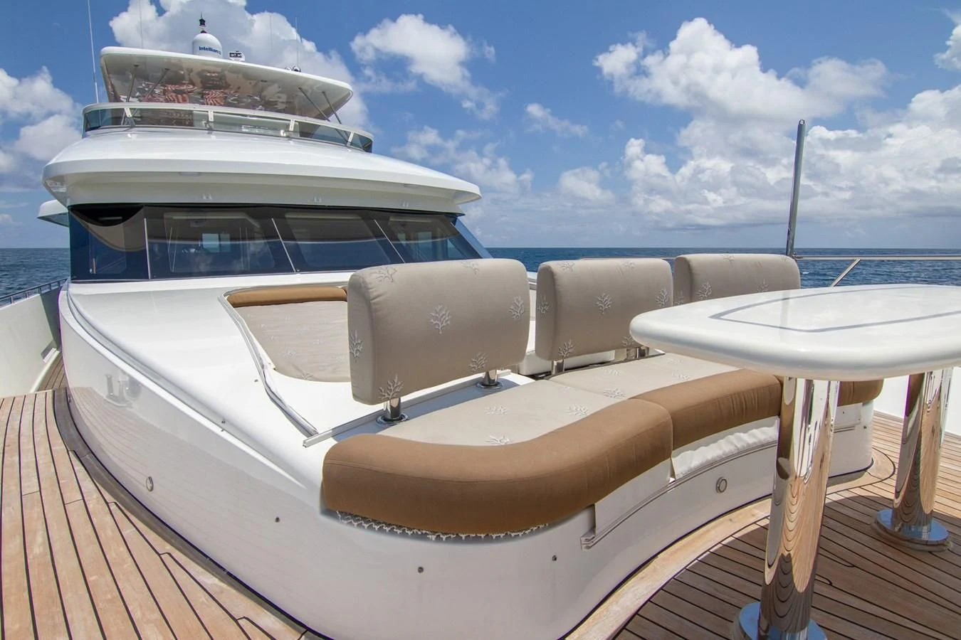 a boat on a deck aboard BRAVO Yacht for Sale