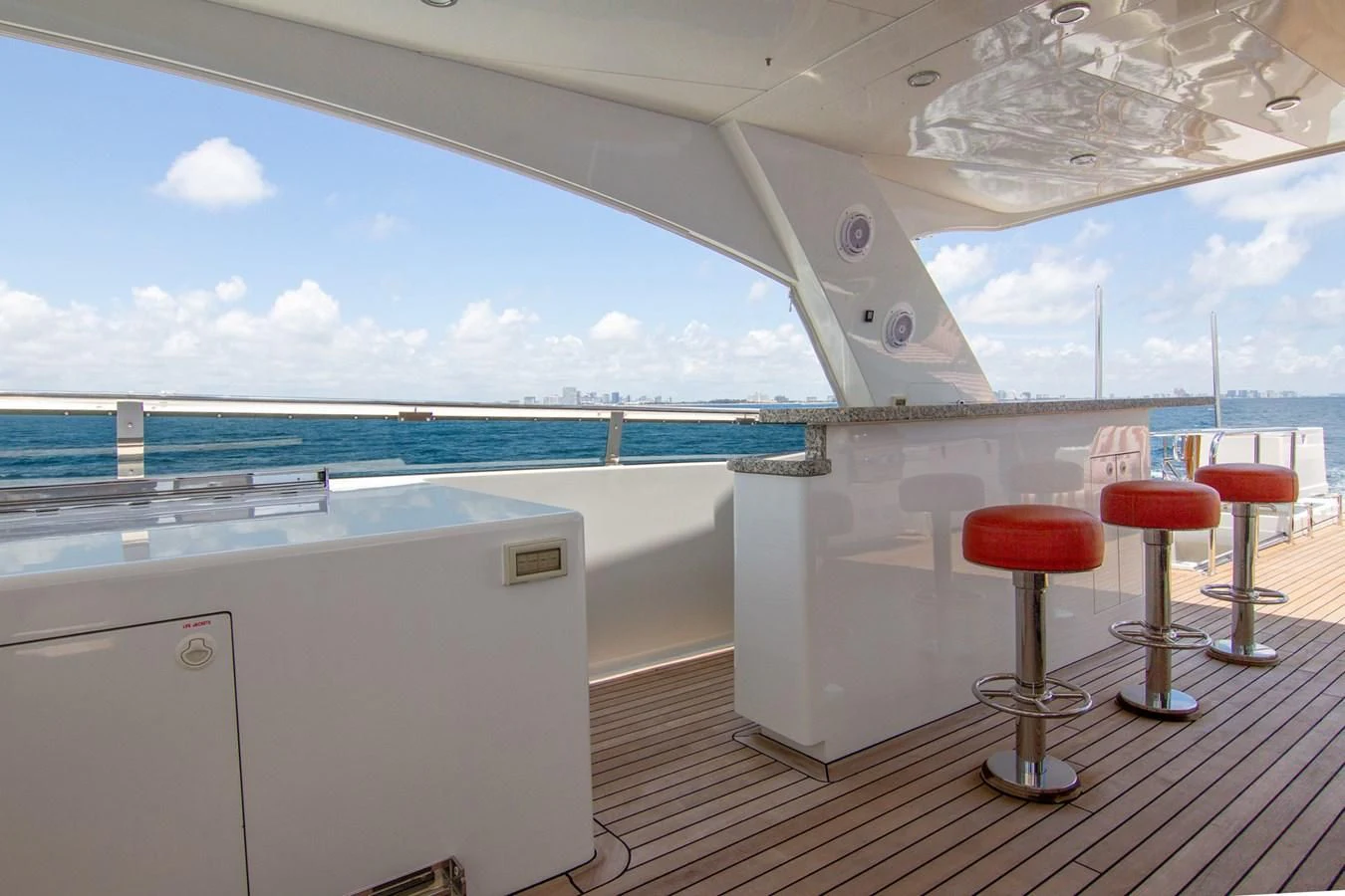 a boat with stools and stools aboard BRAVO Yacht for Sale