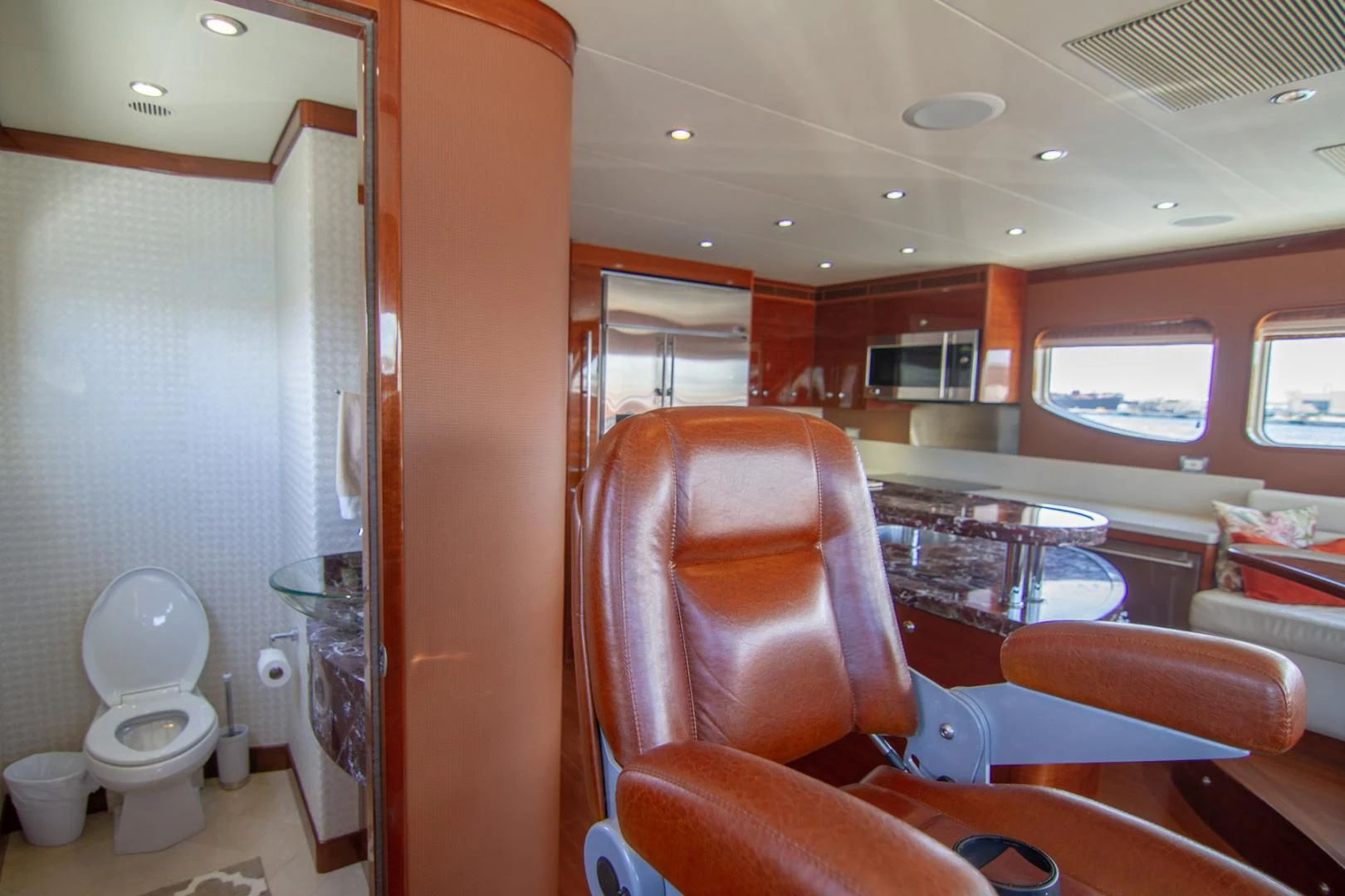 a bathroom with a toilet aboard BRAVO Yacht for Sale