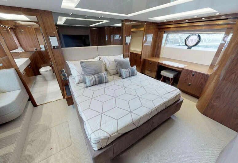 a room with a bed and a wood door aboard SEA WATER II Yacht for Sale