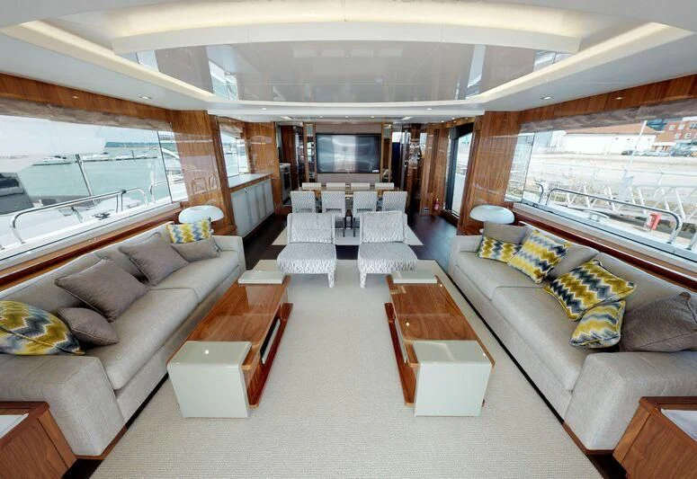 a living room with a large window aboard SEA WATER II Yacht for Sale