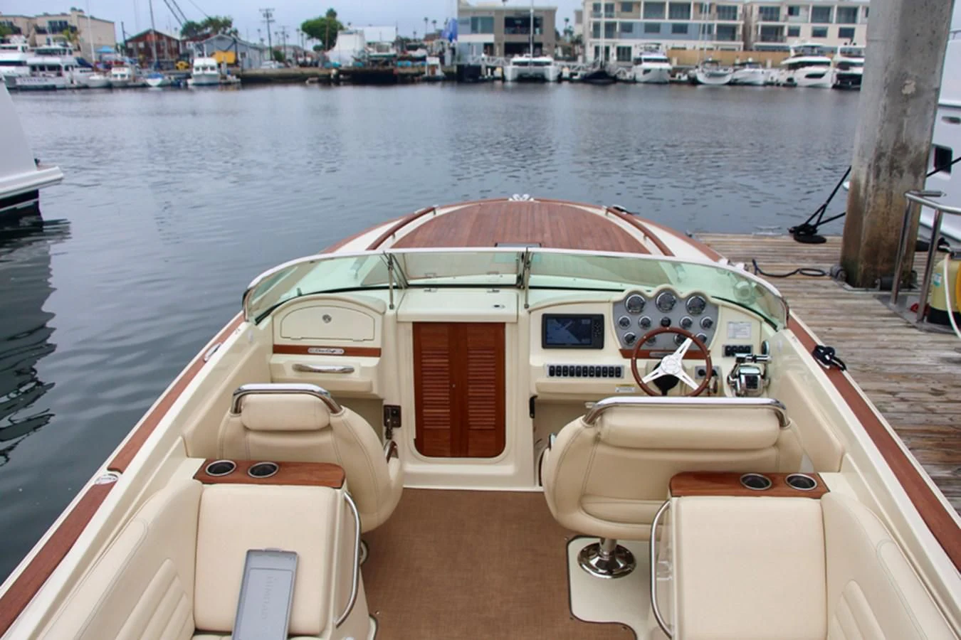 a boat on the water aboard CHRIS CRAFT 28 Yacht for Sale