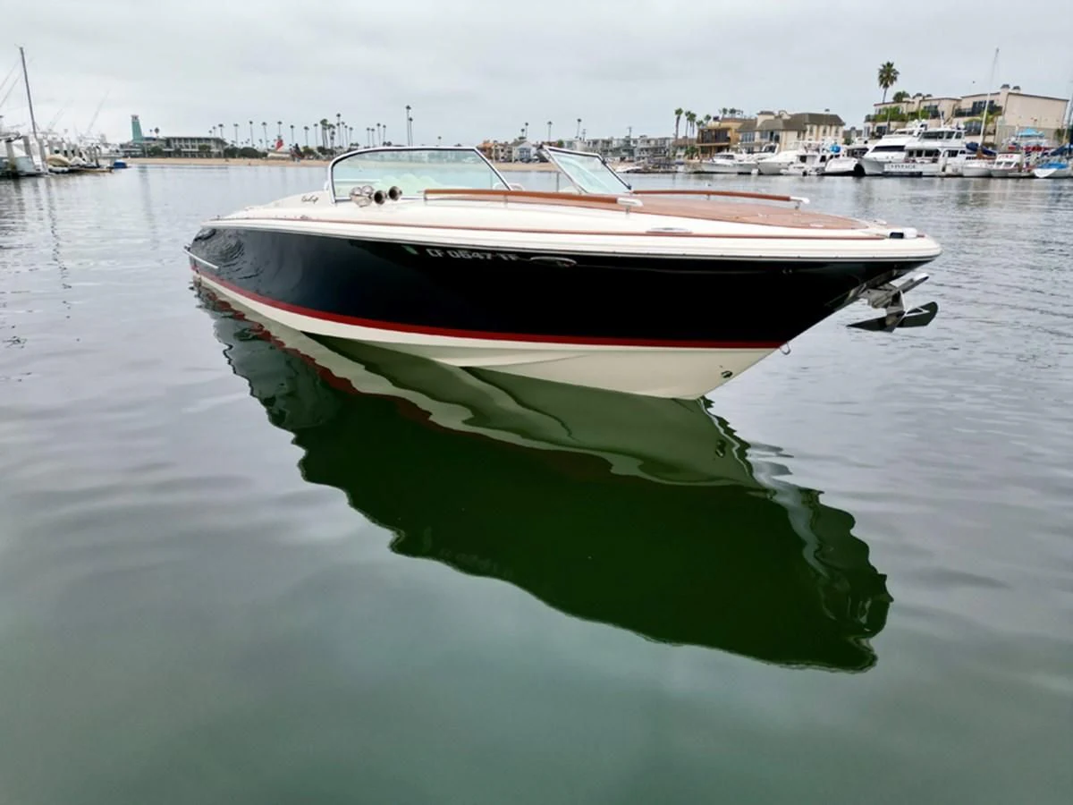 a boat on the water aboard CHRIS CRAFT 28 Yacht for Sale