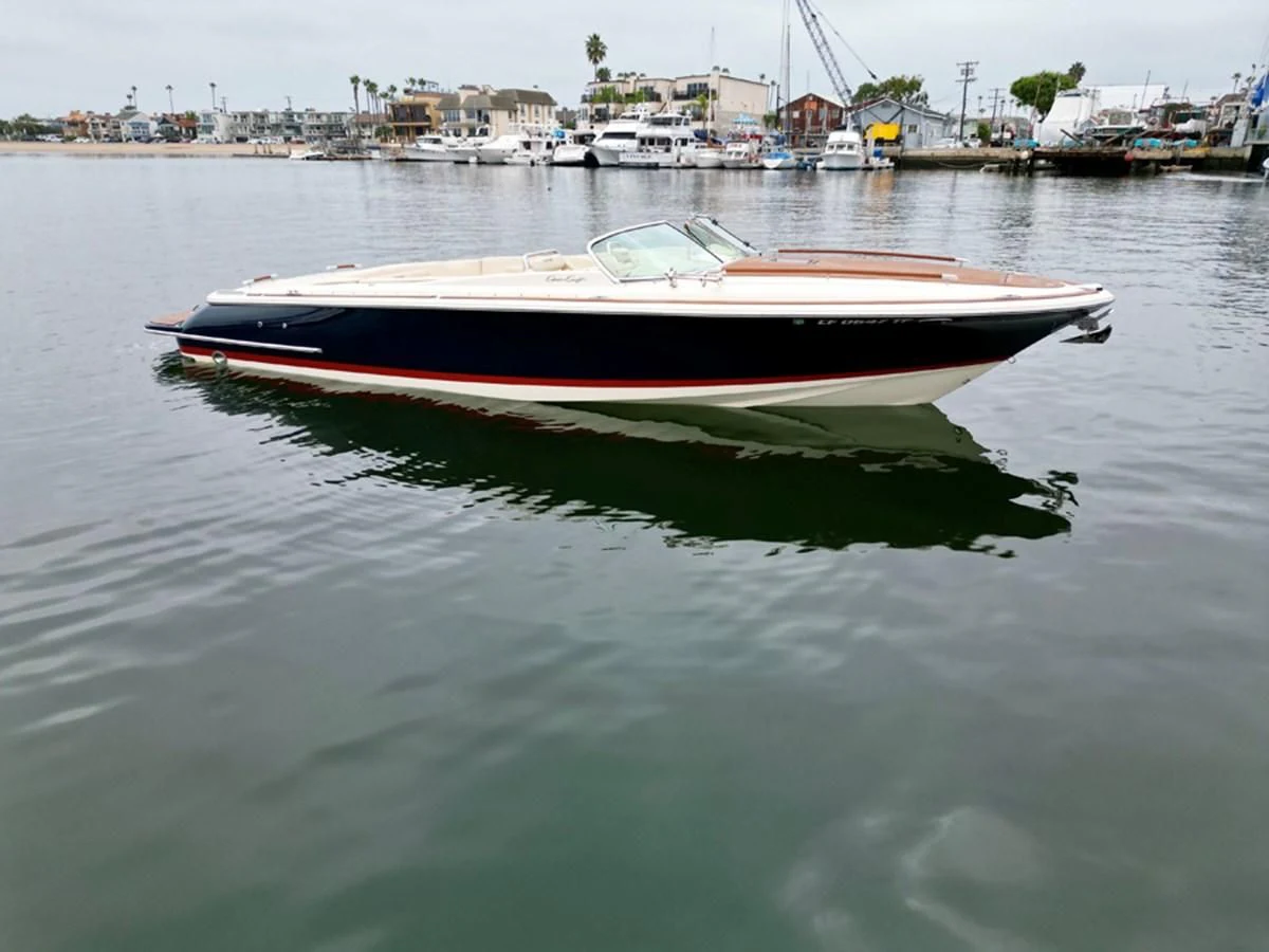 a boat on the water aboard CHRIS CRAFT 28 Yacht for Sale