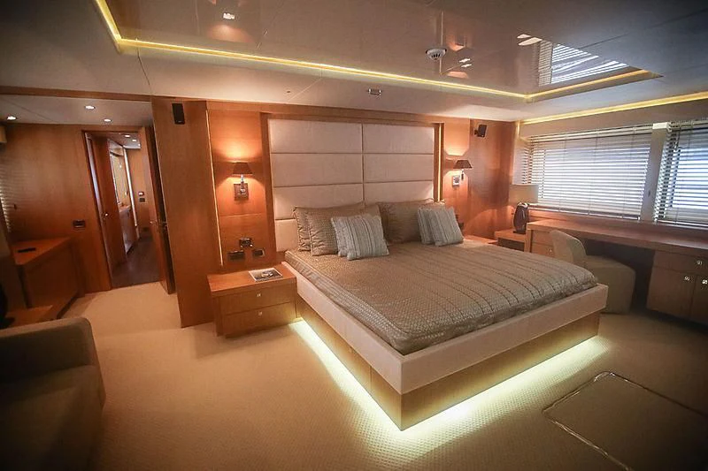 a hotel room with a bed aboard SUN GOLD Yacht for Sale