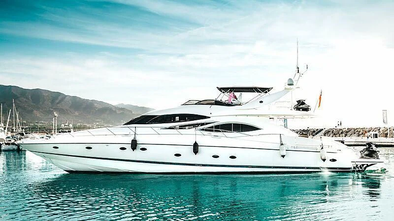 a white yacht in the water aboard HELENA Yacht for Sale